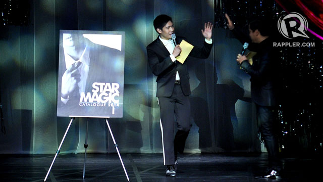 WHO'S ON THE COVER? Martin and Robi unveil the new cover of the Star Magic catalogue