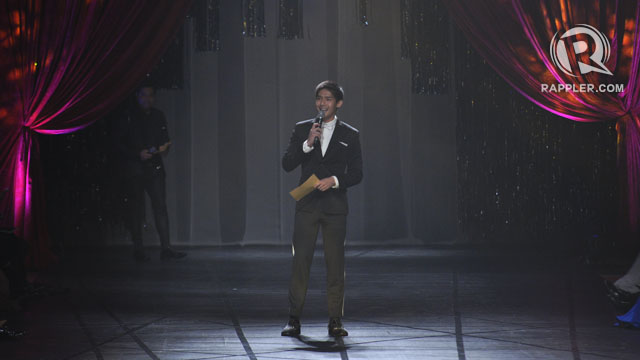 REMINISCING. Robi Domingo reads out a letter to his fellow Star Magic talents