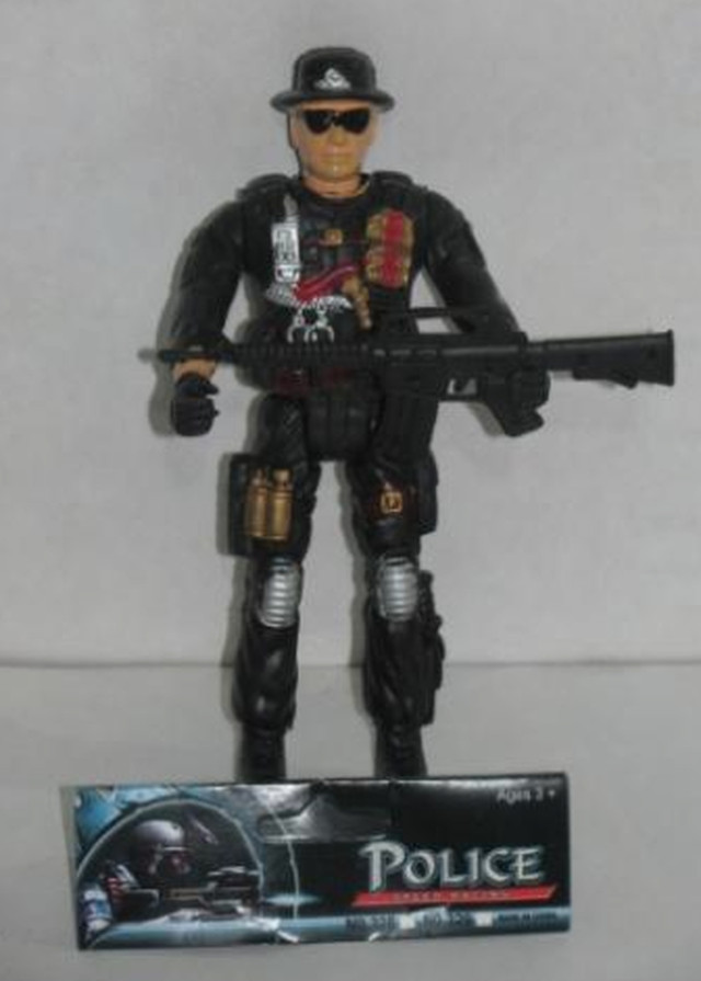 ACTION FIGURE. This sample of a police action figure with 344 of lead