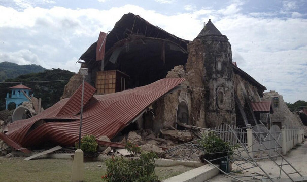 FACADE DESTROYED. The intricately-designed facade of the Church of San Pedro Apostol in Loboc, Bohol completely collapsed. Photo by Robert Michael Poole