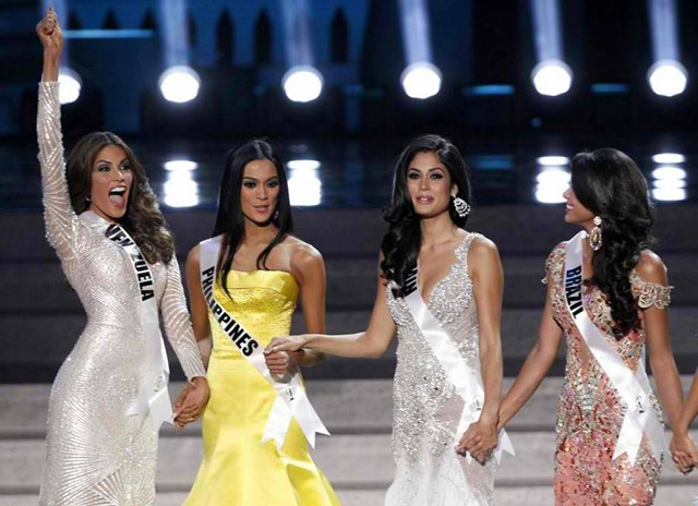 BEST FRIENDS AND FINALISTS. Miss Philippines Ariella Arida holds hands with two of her closest friends in the 2013 Miss Universe pageant — Miss Venezuela Gabriela Isler and Miss Spain Patricia Yurena Rodriguez. Also in the photo is Miss Brazil Jakelyne Oliveira. Photo by Jonas Gaffud