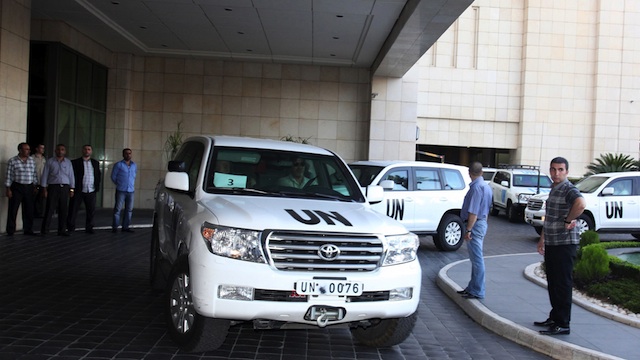 DAMASCUS ARRIVAL. A convoy of UN vehicles carrying team of inspectors from the Organization for the Prohibition of Chemical Weapons (OPCW) arrives at the Four Season hotel in Damascus, Syria, 01 October 2013. EPA/Youssef Badawi