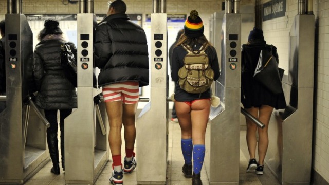 LOOK MA, NO PANTS! Riders enter the New York subway in their underwear as they take part in the 2014 No Pants Subway Ride. Photo by Timothy Clary/Agence France-Presse
