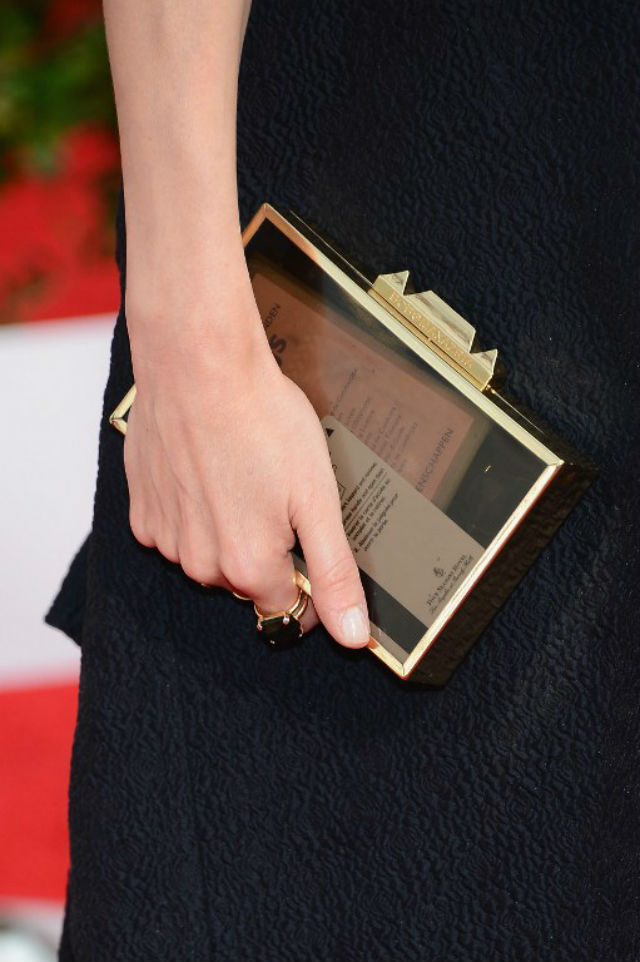 TRANSLUCENT. What’s inside Carice van Houten’s dark clutch? Photo by Ethan Miller / Getty Images North America / Agence France-Presse 
