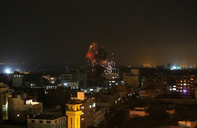 ANOTHER HIT. Smoke rises after Israeli air strikes on Gaza City, 25 August 2014. Mohammed Saber/EPA