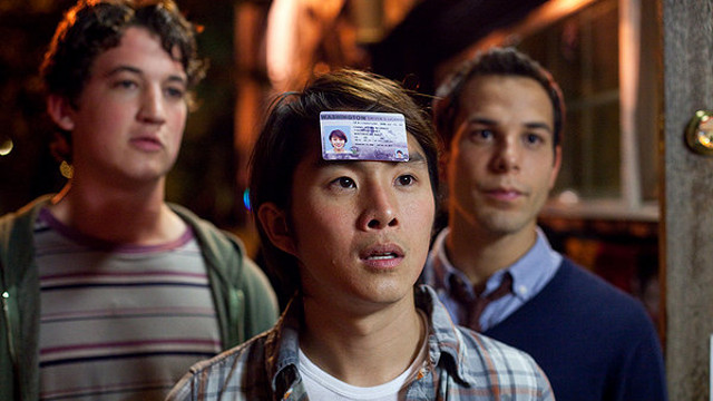 HERE’S MY CARD. Justin Chon ― with Miles Teller (left) and Skylar Astin ― relishes a legal-age perk. All images by Relativity Media