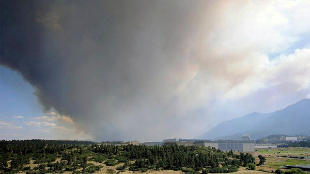 Smoke is seen across Pine Valley from the U.S. Air Force Academy toward the main fire in Colorado Springs, Colo., June 26, 2012. Photo courtesy of the US Air Force