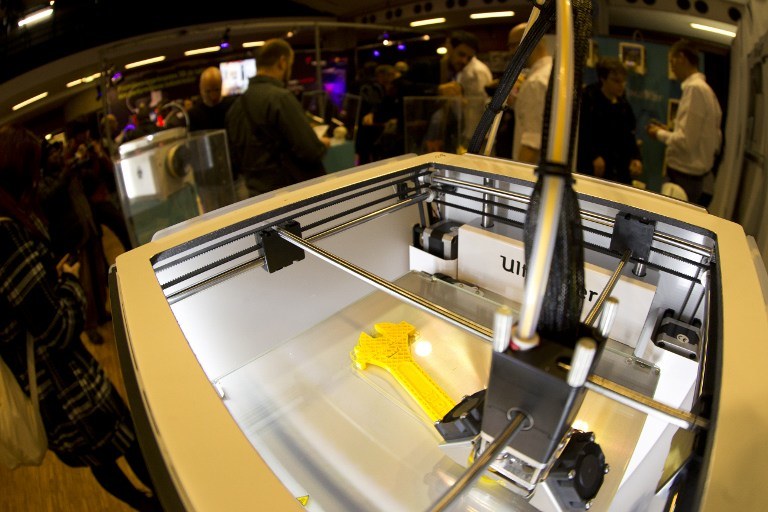 THE FUTURE. A 3D printer is displayed in the " 3D Print Show" exhibition in Paris on November 15, 2013. AFP / Joel Saget