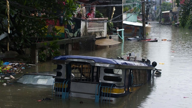 Jeep stranded in a flooded area in Quezon City. Photo by Maurits van Linder