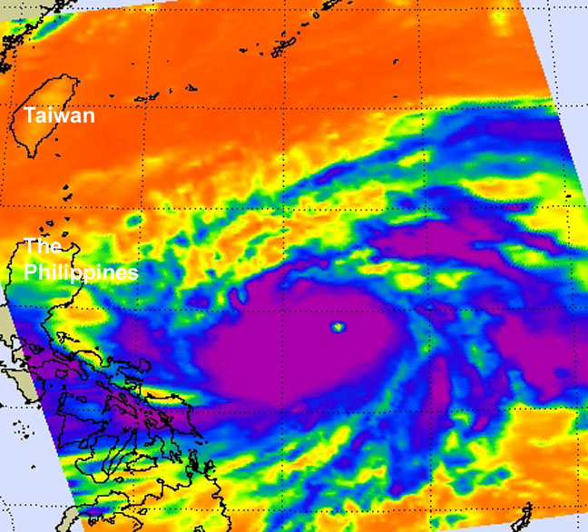 NASA's Aqua satellite passed over Super Typhoon Sanba on Sept. 13 at 12:47 a.m. EDT. AIRS infrared data found an eye (the yellow dot in the middle of the purple area) about 20 nautical miles wide, surrounded by a thick area of strong thunderstorms (purple) with very cold cloud temperatures. Credit: NASA/JPL, Ed Olsen
