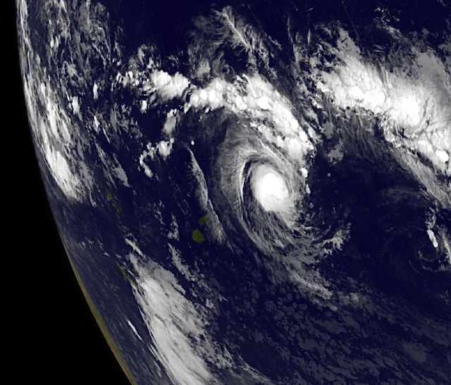 NOAA's GOES-15 satellite captured this visible image of newborn Tropical Storm Evan in the South Pacific on Dec. 12, 2012 at 1500 UTC (10 a.m. EST). Credit: NASA GOES Project