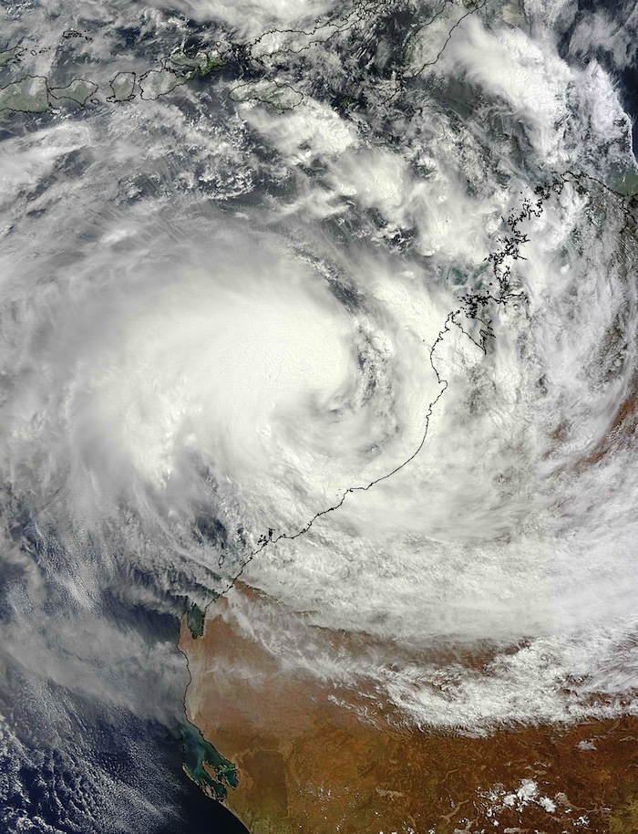 On Feb. 25 at 0215 UTC (9:15 p.m. EST, Feb. 24) the MODIS instrument aboard NASA's Terra satellite captured this visible image of Cyclone Rusty closing in on the northwestern coast of Western Australia. Rusty's outer band of thunderstorms stretched from Broome to Port Hedland. Credit: NASA Goddard MODIS Rapid Response Team 