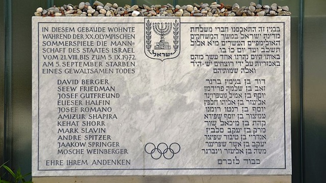 COMMEMORATION. Plaque in front of the Israeli athletes' quarters commemorating the victims of the Munich massacre. The inscription, in German and Hebrew, reads: "The team of the State of Israel lived in this building during the 20th Olympic Summer Games from 21 August to 5 September 1972. On 5 September, [list of victims] died a violent death. Honor to their memory." Photo courtesy of High Contrast / Wikipedia.