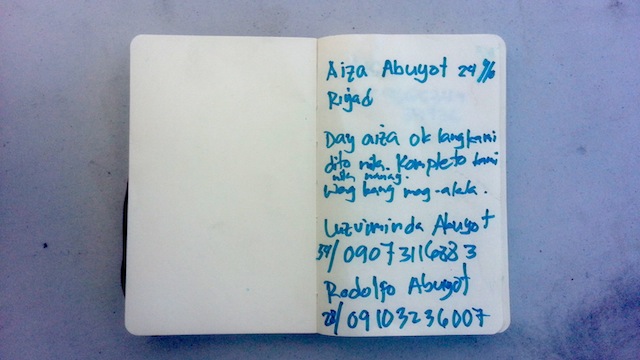 WE'RE OKAY. Rodolfo Abuyot's note to his sister Aisa. Photo by Patricia Evangelista