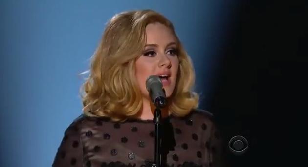 ROLLING WITH A BABY. Adele performing 'Rolling In the Deep' at the Grammy Awards. Screen grab from YouTube