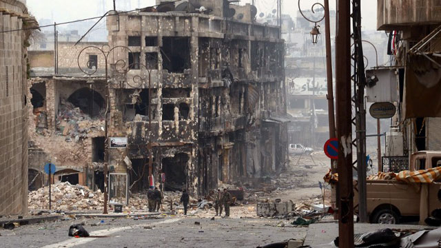 CITY DESTROYED. Syrian government troops take position in a heavily damaged area in the old city of Aleppo in northern Syria on January 12, 2013. AFP PHOTO/STR