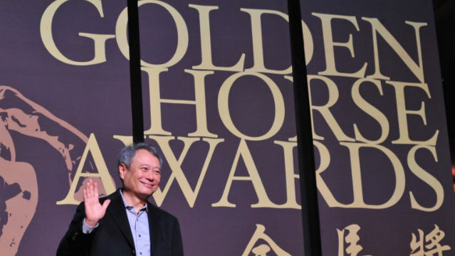 AWARD WINNING DIRECTOR. Oscar-winning director Ang Lee waves during a media event for the 50th Golden Horse awards in Taipei. AFP Photo