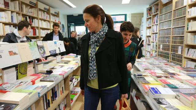 'VIVE LE LIVRE.' French novelist Aurelie Filippetti, currently the Culture Minister, at a Paris bookshop taking part in the 2013 'Fete de la librairie' festival in April. Photo: Pierre Verdy/AFP