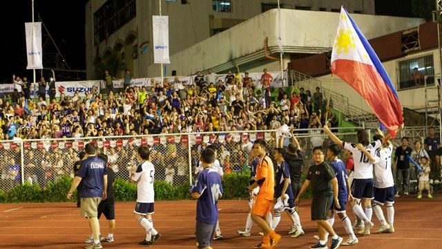 PINOY PRIDE. Azkals wave the Philippine flag after their game against LA Galaxy in front of a packed stadium. December 3, 2011. Rupert Ambil.