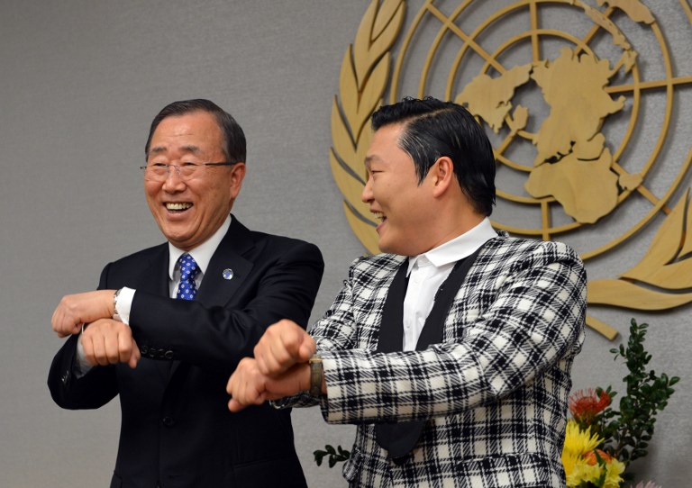 DIPLOMACY, GANGNAM STYLE. South Korean singer Psy (R), whose real name Park Jae-sang, does a dance-step with United Nations Secretary General Ban Ki-Moon (L) just before their meeting October 23, 2012 at UN headquarters in New York. AFP PHOTO/Stan HONDA