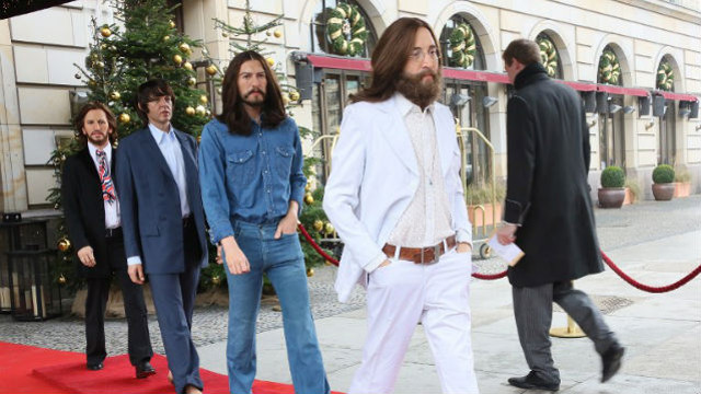 ICONIC. Wax figures of the Fab Four as an ‘Abbey Road’ stand outside the Hotel Adlon in Berlin.  Photo: Stephanie Pilick/GERMANY OUT/AFP
