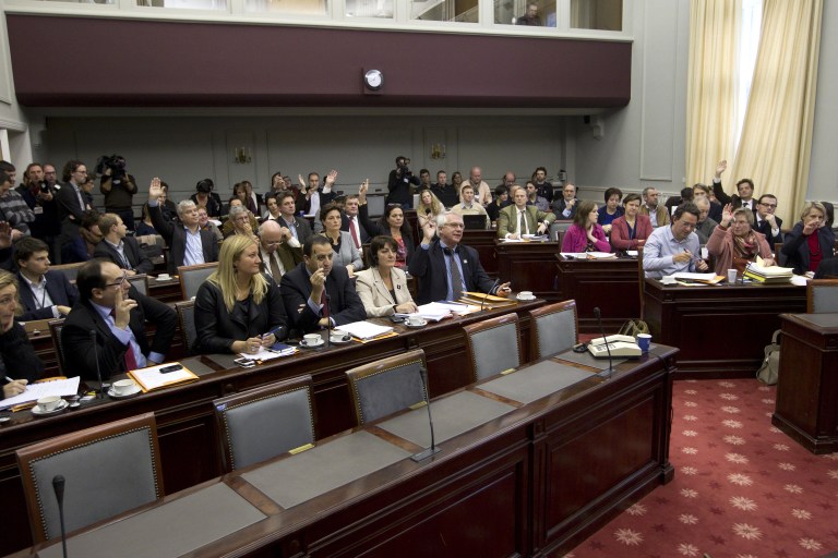 EUTHANASIA FOR CHILDREN: Belgium's Senate members vote during a session of the Senate's justice and social affairs commission on the expansion of the euthanasia law for minors. Photo by Kristof Van Accom/AFP