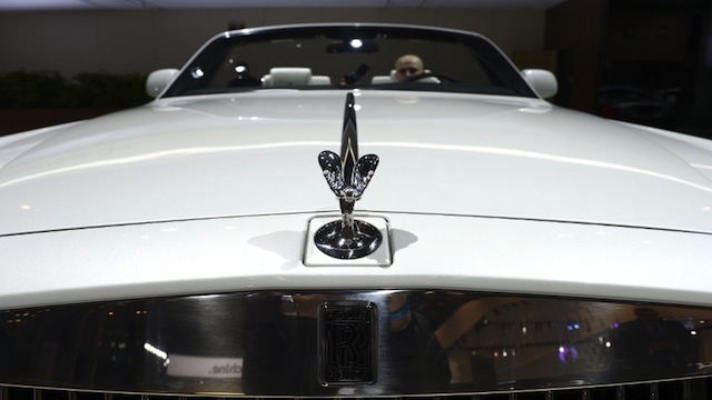 LUXURY CAR. The 2014 Rolls-Royce Ghost on display during the second press preview day at the New York International Auto Show on March 28, 2013 in New York. AFP PHOTO / TIMOTHY A. CLARY