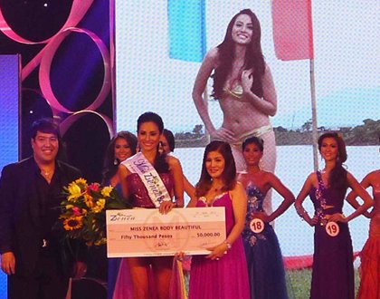 BEST IN SWIMSUIT. Rehman received a P50,000 check as part of her prizes for this award.