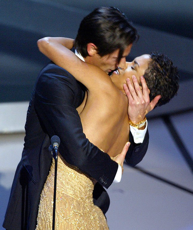 THE KISS. Actor Adrien Brody kisses presenter Actress Halle Berry as he accepts his Oscar for his role in "The Pianist" during the 75th Academy Awards in 2003.