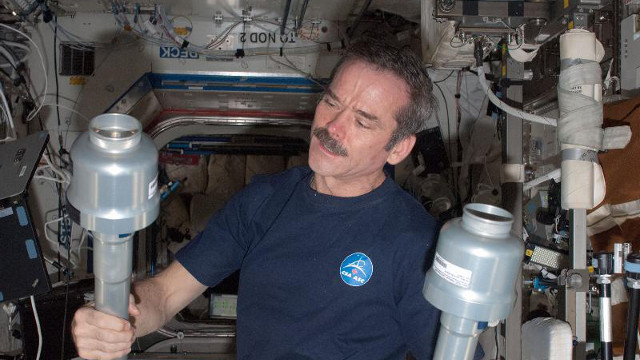 SPACE HANGOUT. Canadian Space Agency astronaut Chris Hadfield, Expedition 34 flight engineer, in the Destiny laboratory of the International Space Station. Photo from NASA