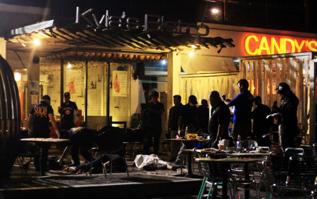 CRIME SCENE. Outside Kyla's Bistro at an arcade in Cagayan de Oro City, right after the explosion. Photo EPA/Bobby Lagsa 