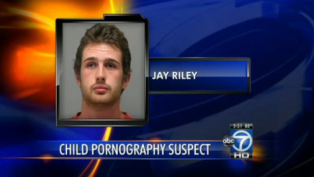 SUSPECT. Police arrest 21 year-old Jay Riley for child pornography possession after he goes to the police station to verify if a child pornography warning on his computer was legitimately from the FBI. Screen shot from WJLA-TV