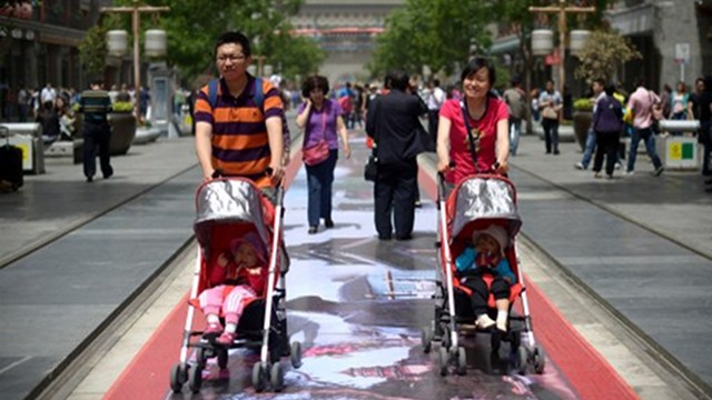 GROWING MIDDLE CLASS. More families in China are joining the middle class, thanks to sustained economic growth. Photo by AFP