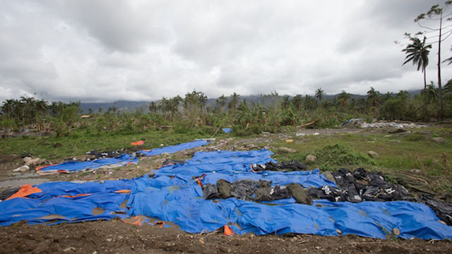 Hundreds of bodies remain unburied in New Bataan, Compostela Valley. Photo by John Javellana 25 Dec 2012.