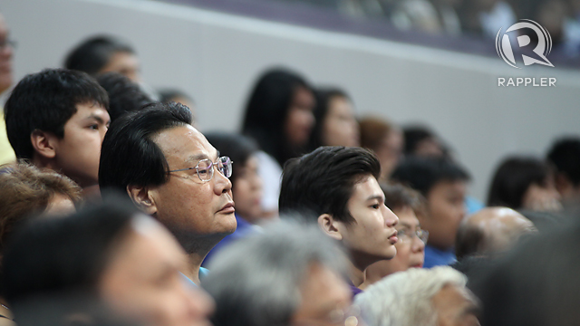 BLEEDING BLUE. Dismissed chief justice Renato Corona was spotted with his wife Cristina watching an Ateneo UAAP game, Sunday, July 15. Josh Albelda.