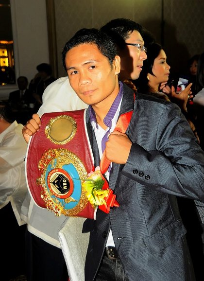 BOXER OF THE YEAR. Donnie Nietes shows off his championship belt. March 25, 2012. Hanz Lustre.