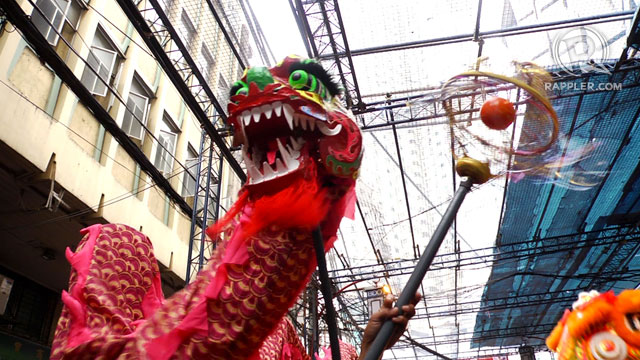 DRAGON DANCE. During Chinese New Year, dragon lions rule the streets