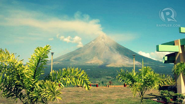 TOURIST DRAW. Perhaps Albay's most famous landmark Mount Mayon now has an 8 kilometer buffer zone around it for safety as part of UNESCO's requirement. Governor Salceda shared the the local government is using that buffer zone to create more forest cover as trees will be protected from being trampled on there. File Photo by Eleazar Cuela/Rappler