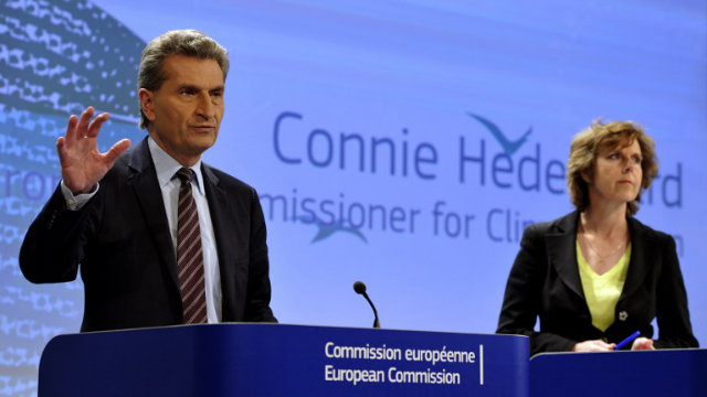 EU DIVISION. A source tells AFP that EU Climate Change Commissioner Connie Hedegaad (R) and Energy Commissioner Guenther Oettinger (L) are at odds over the EU's reduction target for CO2 emissions. File photo by Georges Gobet/AFP