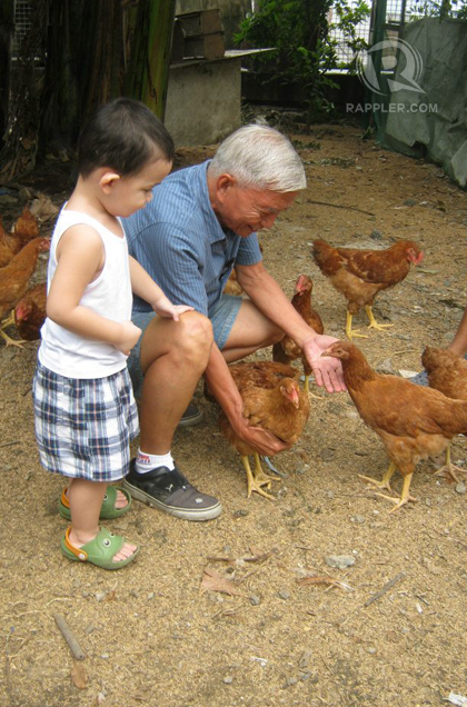 LUIS, LOLO AND CHICKENS. Luis gets to experience moments like this that other kids don't. Photo from Bubbles Saldavor