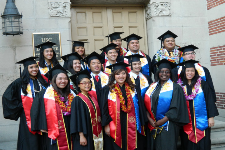 POMP AND CIRCUMSTANCE. Alfred Dicioco (Center) poses with fellow students from USC's FilAm organization