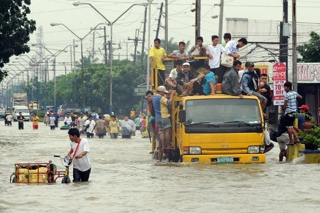 DISASTERS. Capital Manila battled floods during monsoon rain in August. Asia's cities are becoming increasingly vulnerable to natural disasters as they struggle with poor planning, population explosions and climate change, the Asian Development Bank warns. Photo by AFP