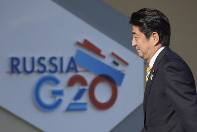 SHINZO ABE. Japan’s Prime Minister Shinzo Abe arrives for the start of the G20 summit on September 5, 2013 in Saint Petersburg. AFP PHOTO / ALEXANDER NEMENOV
