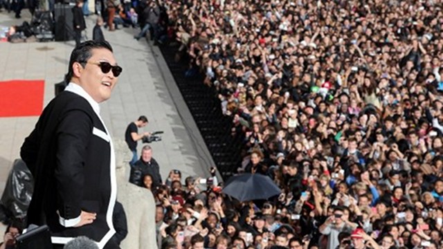 VIRAL. South Korean rapper Park Jae-Sang, also known as Psy, performs "Gangnam Style" in front of a crowd during a flashmob on November 5, 2012 in Paris. The video to "Gangnam Style" went viral after its July release, becoming the second most viewed clip in YouTube history, where it has notched up more than 650-M hits despite being sung almost entirely in Korean. Photo by AFP