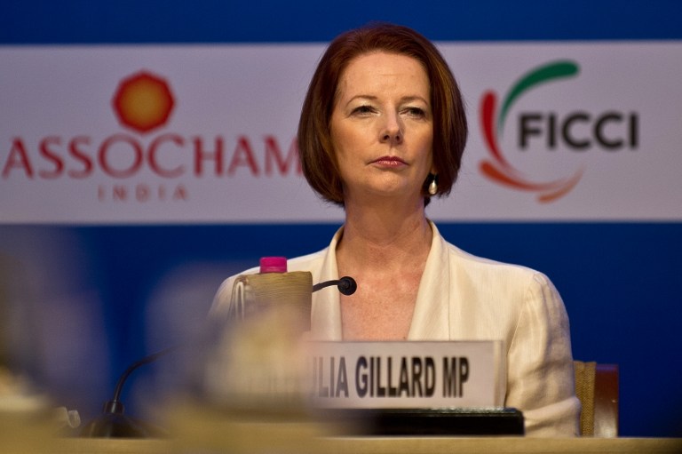 Australian Prime Minister Julia Gillard looks on during a business luncheon meeting in New Delhi on October 17, 2012. AFP PHOTO/ MANAN VATSYAYANA