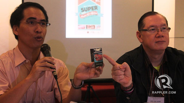 GRAPHIC IMAGES. SEATCA Director Ulysses Dorotheo and DOH Asec Eric Tayag show a cigarette packaging from Australia. Photo by Jee Geronimo/Rappler
