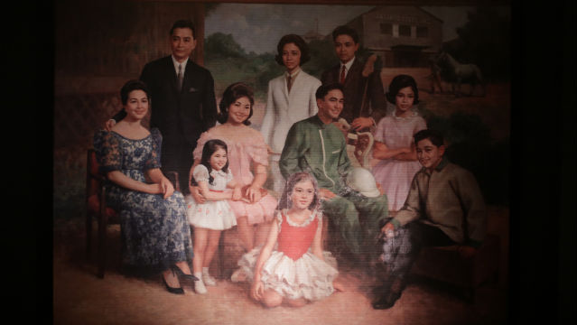 FAMILY TIES. This replica of Fernando Amorsolo’s painting of the Jacinto family in the 1960s was shown at the Ayala Museum exhibit. The real painting hangs on the wall of the Jacintos' home