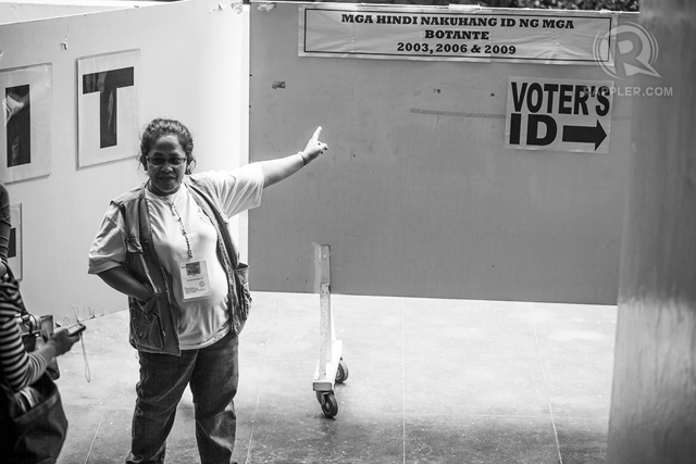 THIS WAY, PLEASE. Bold signs for voters who forgot to get IDs. All photos by Leah A. Valle/RAPPLER