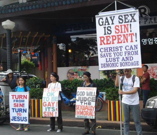HOMOPHOBIA. Bashers seeking to convert marchers show up every year during the pride parade. Photo by Karen Cruz