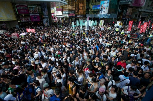 PROTESTS. Thousands take to the streets calling for universal suffrage and chanting slogans against new Hong Kong Chief Executive Leung Chun-ying in Hong Kong on July 1, 2012 only hours after Chinese President Hu Jintao completed his three-day visit to the southern Chinese territory. Photo by AFP